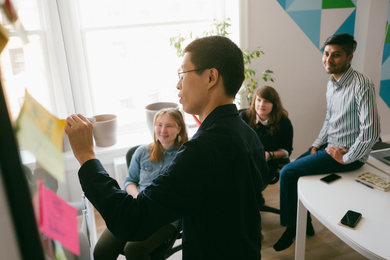 Learning together at a whiteboard