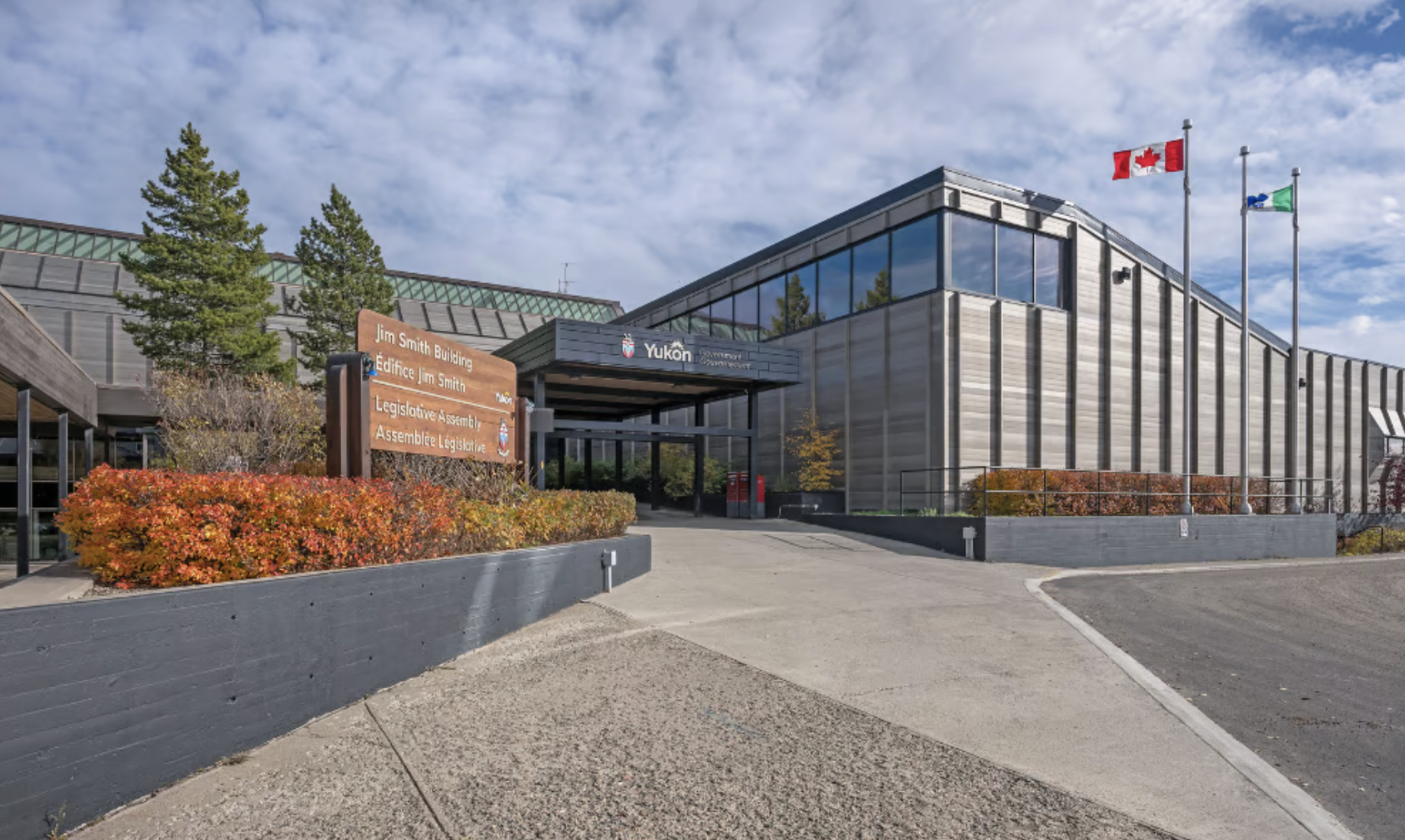 Government of Yukon building with some hints of nature and a beautiful sky