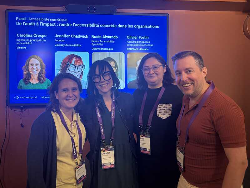 Olivier Fortin, Jennifer Chadwick, Rocío Alvarado, and Carolina Crespo stand together in front of the EvolveDigital Montréal presentation screen after the digital accessibility panel.
