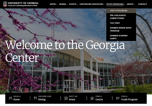 The Georgia Center website homepage with the "Youth Programs" dropdown open, showing submenu items and a large background image of the building.