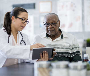 Doctor consulting with patient in a clinical setting