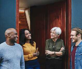 People gathered together in a doorway