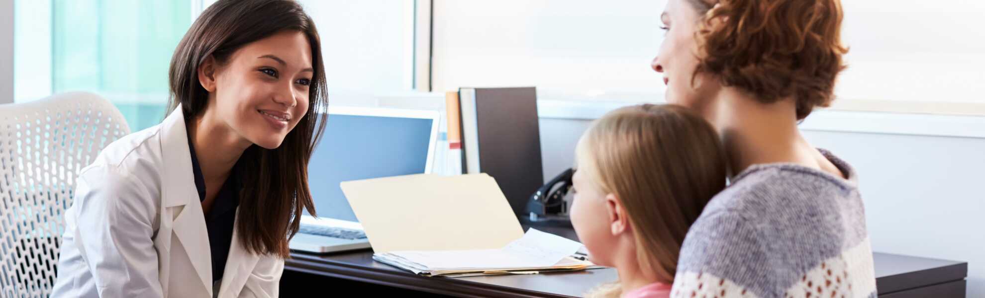 Doctor speaking to patients