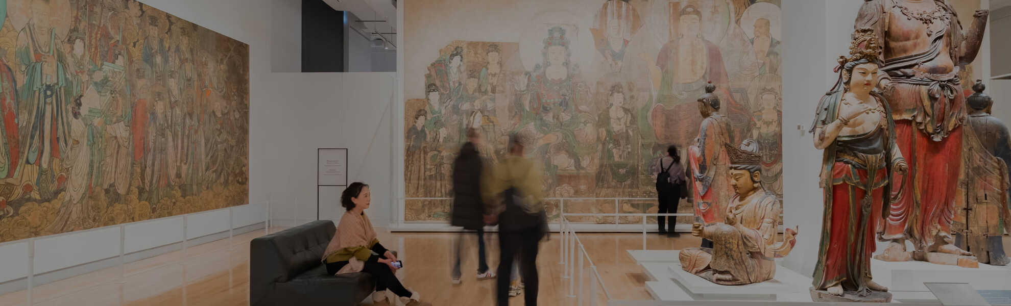 Royal Ontario Museum banner showcasing an exhibition space full of vibrant movement