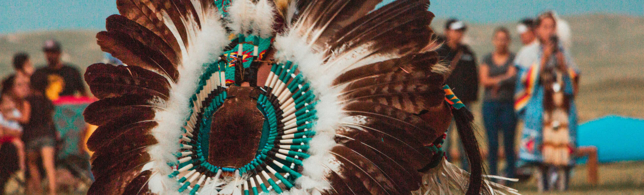 Someone in Indigenous ceremonial dress