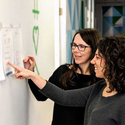 Two designers learning together