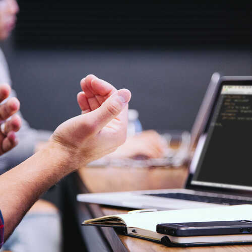 Students learning on their laptops