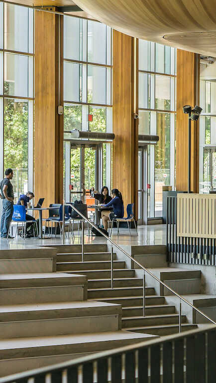 Atrium with students gathering on a university campus