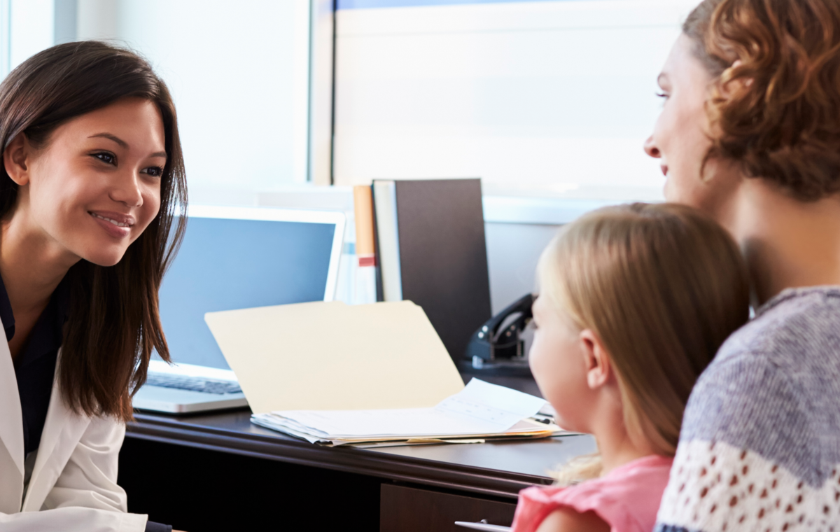 Doctor speaking to patients
