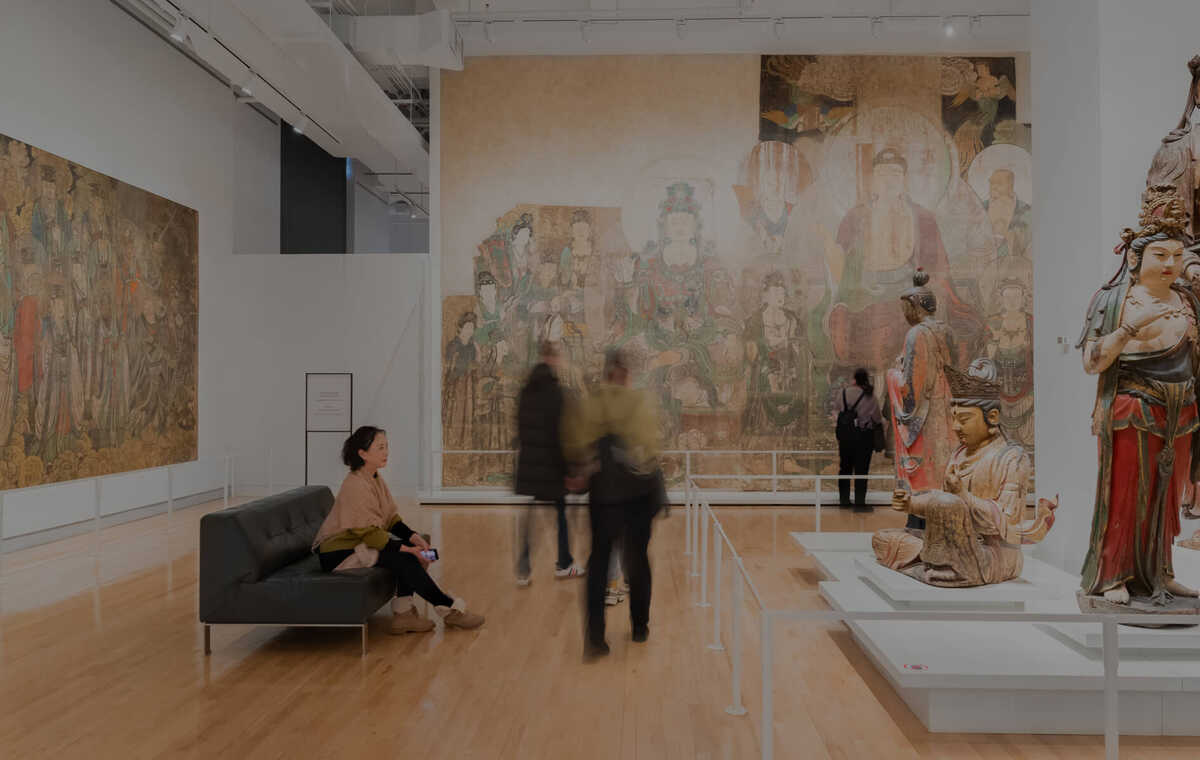 Royal Ontario Museum banner showcasing an exhibition space full of vibrant movement